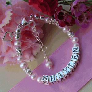 Freshwater Pink Pearls and Sterling Silver Twists Custom Baby Name Bracelet